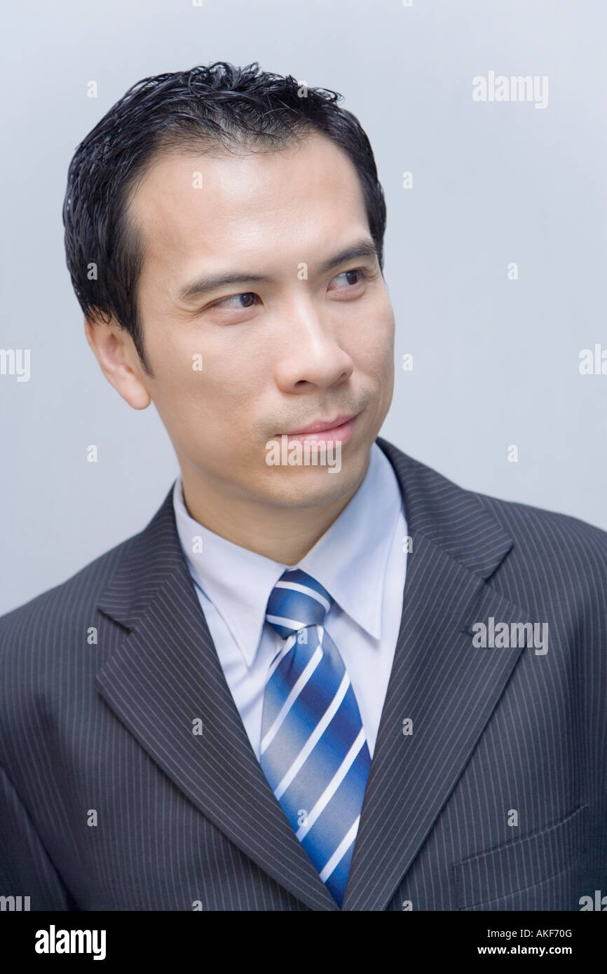 Close-up of a businessman looking away Stock Photo