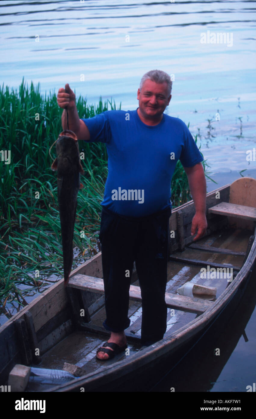 Angler mit fisch hi-res stock photography and images - Alamy