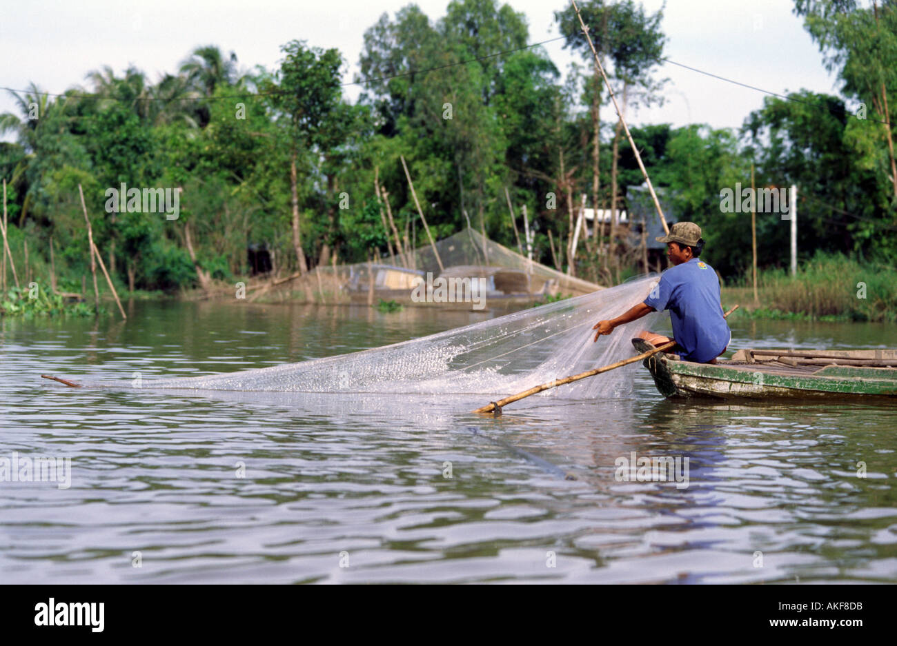 Fisherman in the Mekong Delta Vietnam South East Asia Stock Photo - Alamy