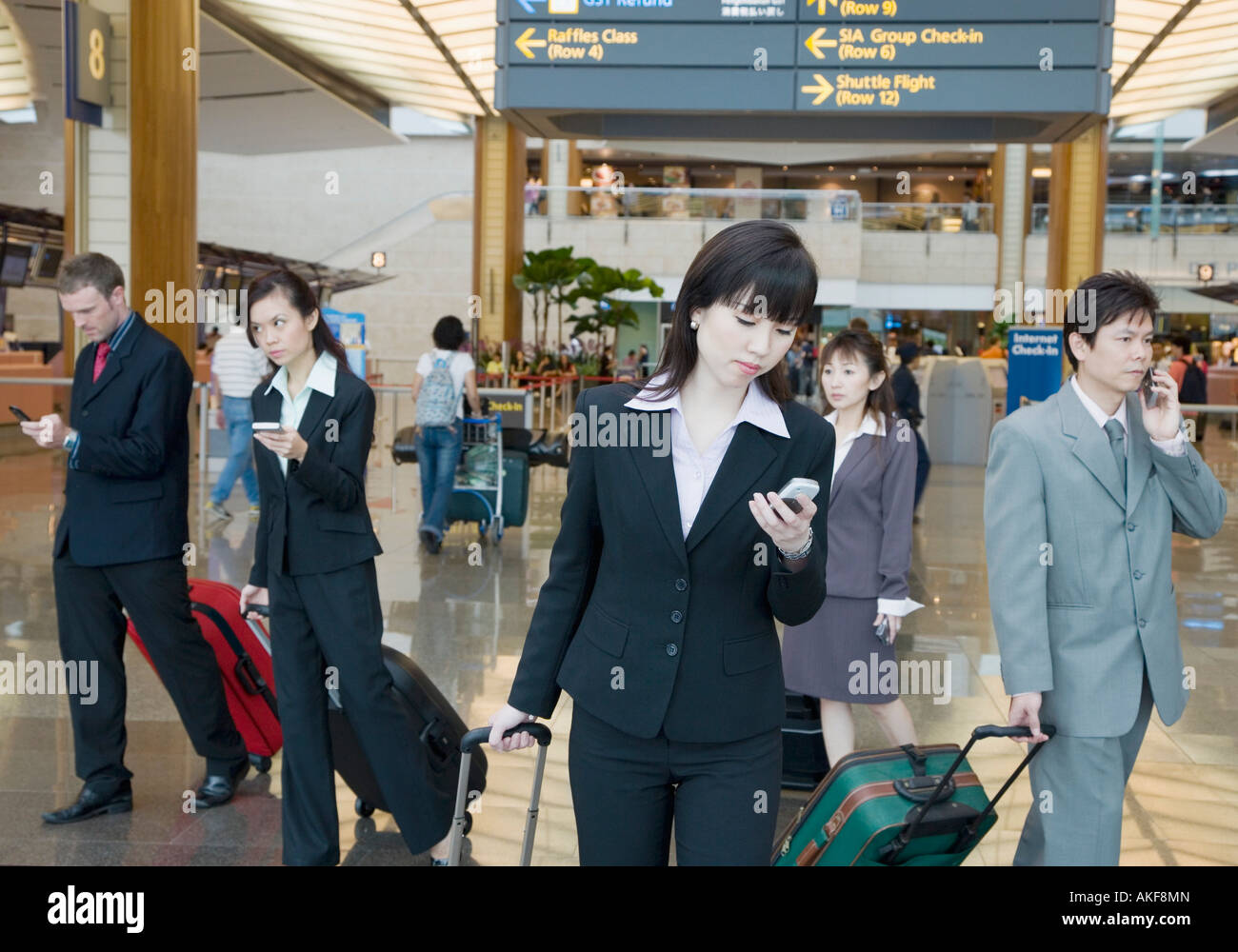 business-executives-leaving-an-airport-stock-photo-alamy