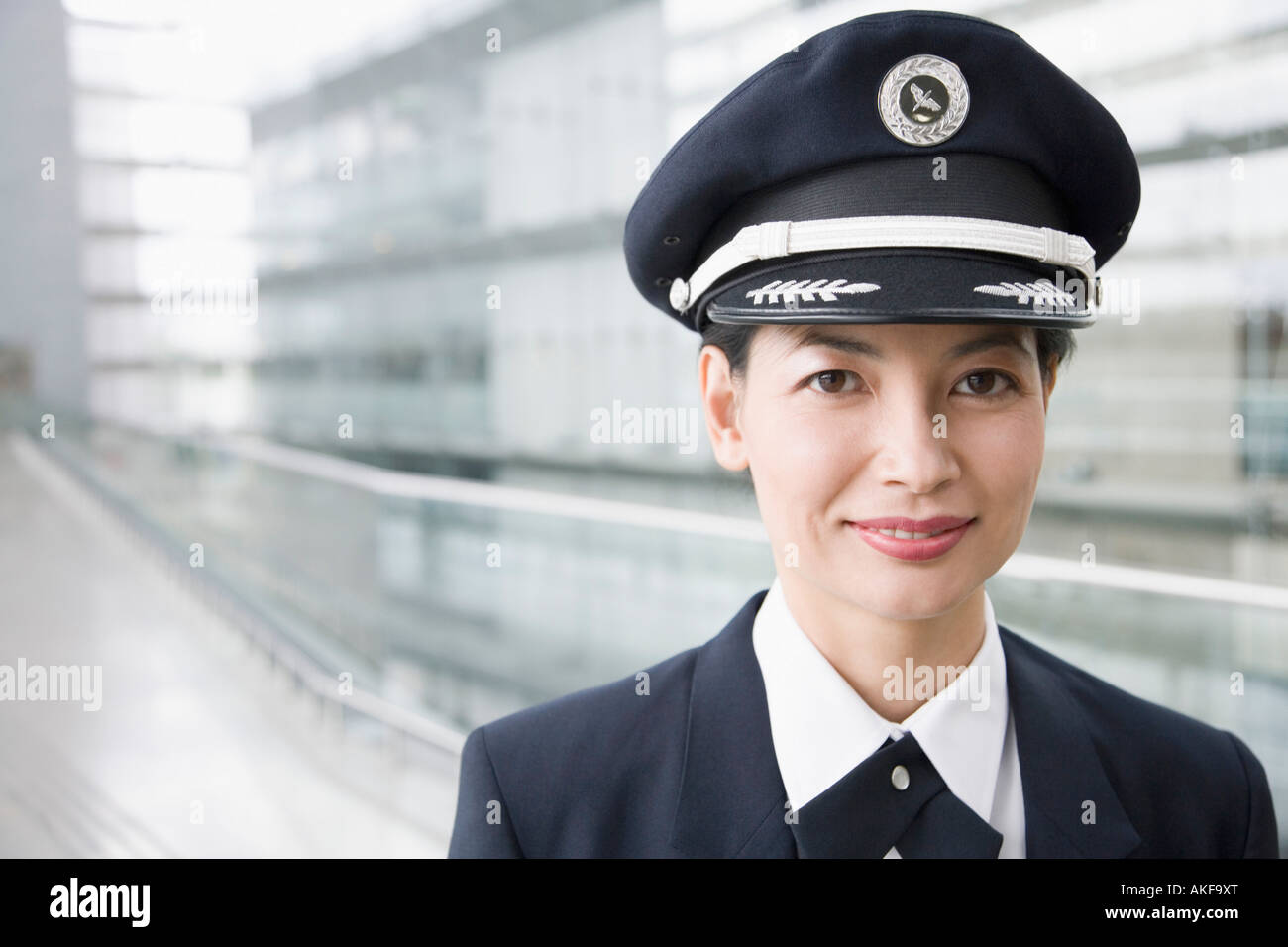 Portrait of a female pilot smiling Stock Photo