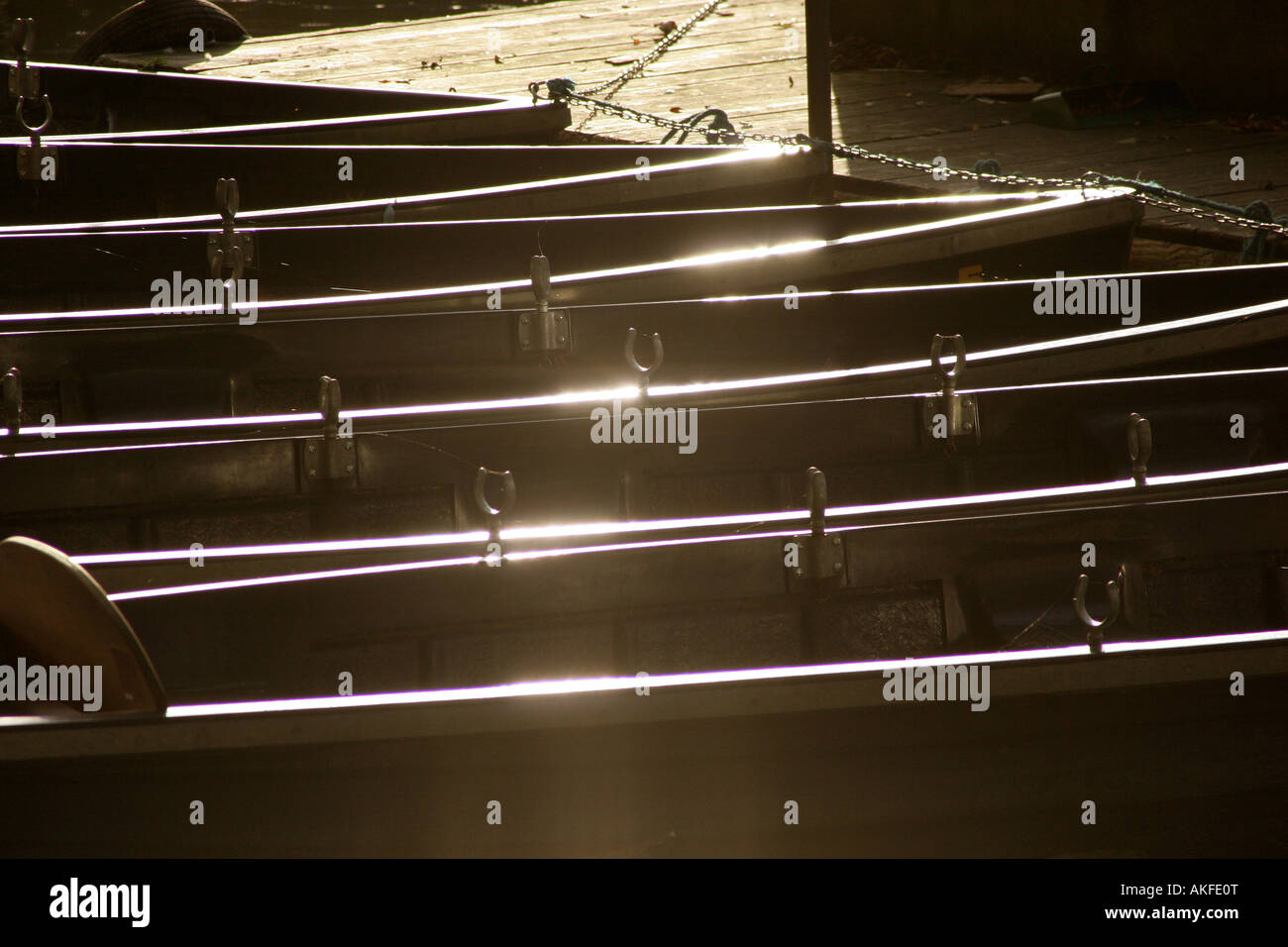 Punts moored on river in Oxford Stock Photo