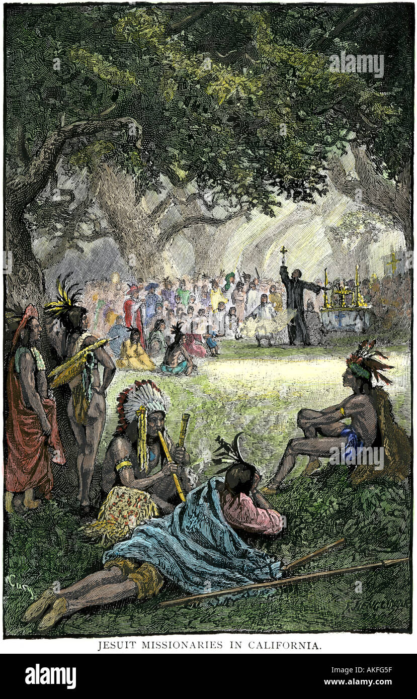 Spanish missionaries addressing Native Americans in California. Hand-colored woodcut Stock Photo