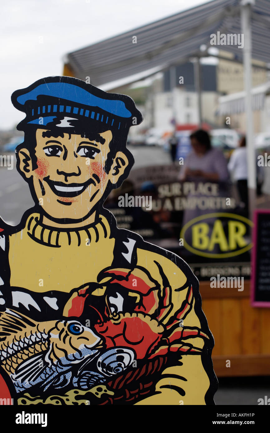 Fisherman sign outside sea food restaurant Stock Photo - Alamy