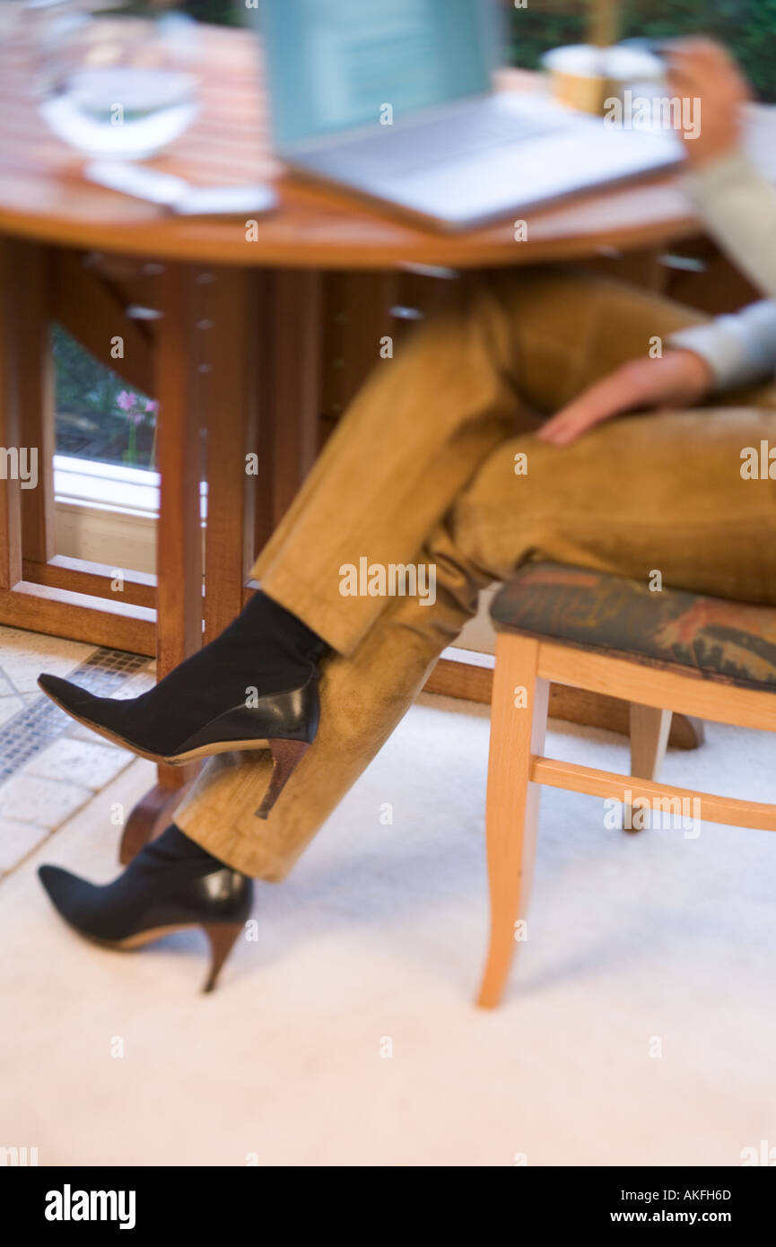 Legs desk under hires stock photography and images Alamy