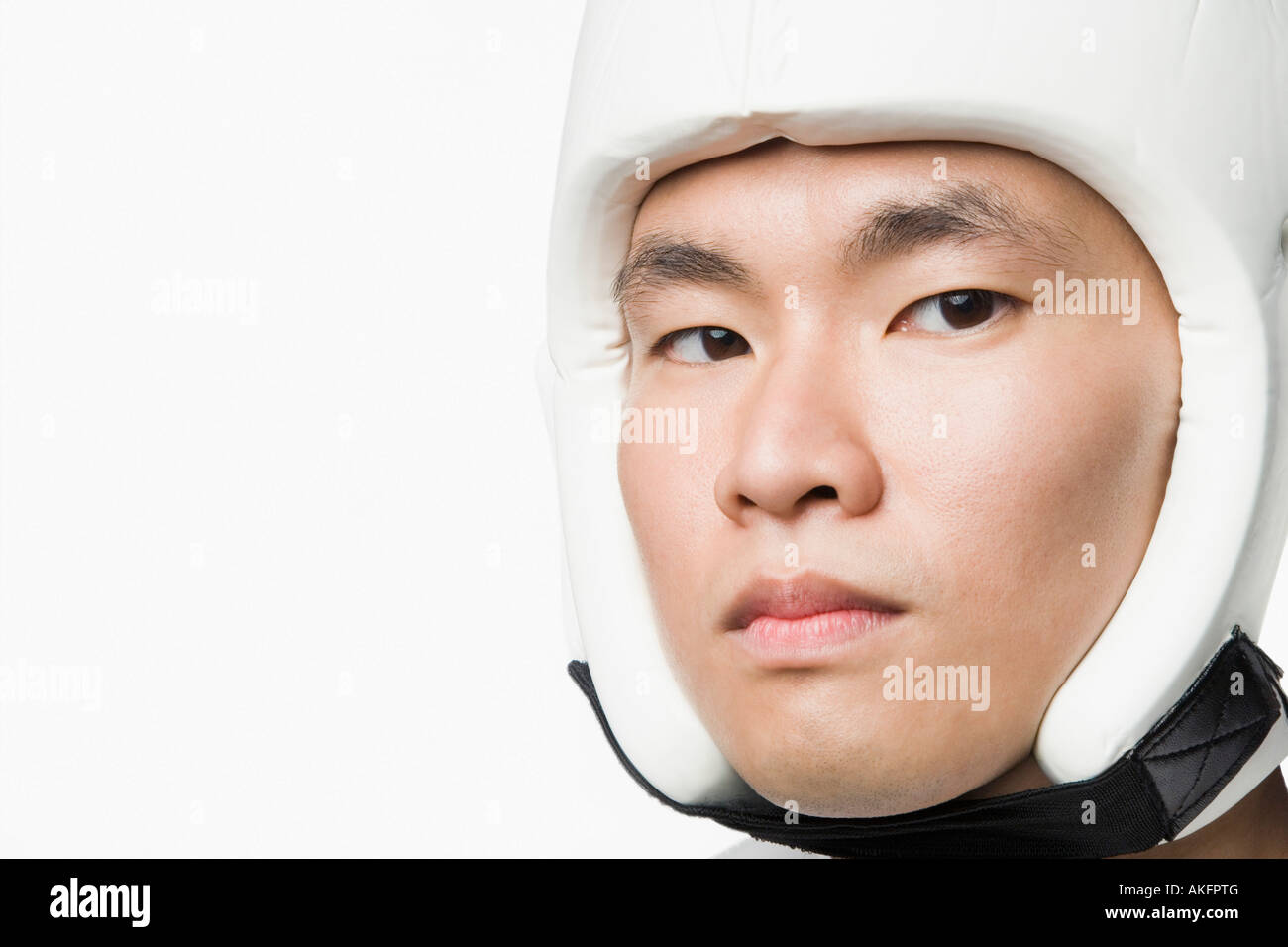 Portrait of a young man wearing a sports helmet Stock Photo Alamy