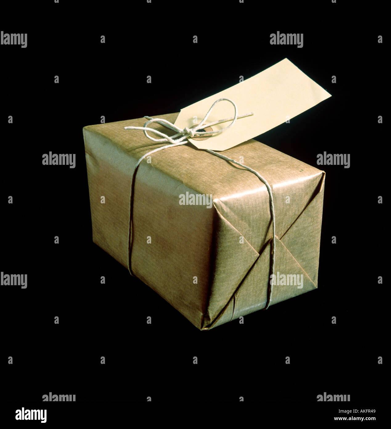 parcel wrapped in packing paper editorial use only Stock Photo