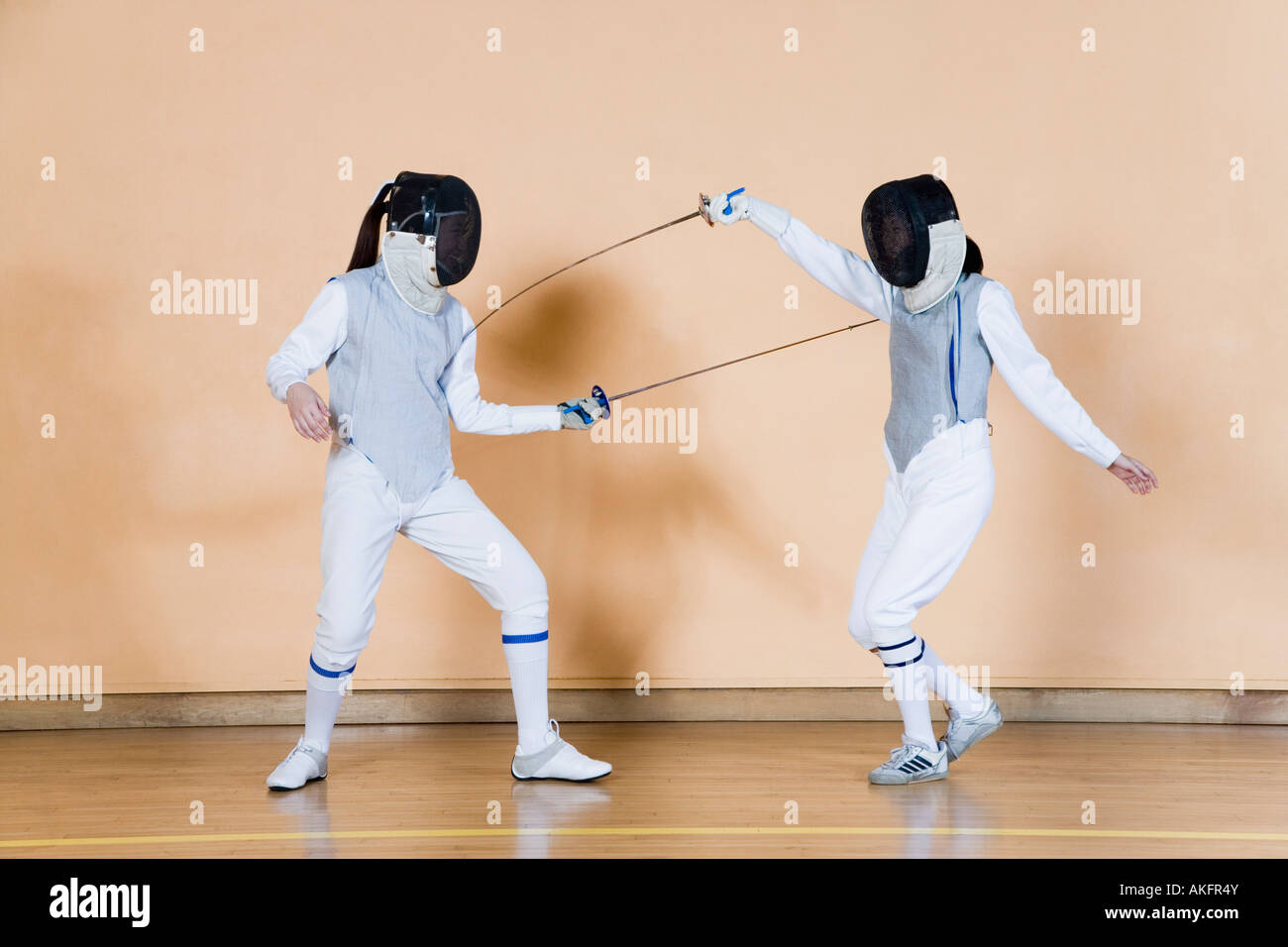 Two fencers fencing Stock Photo