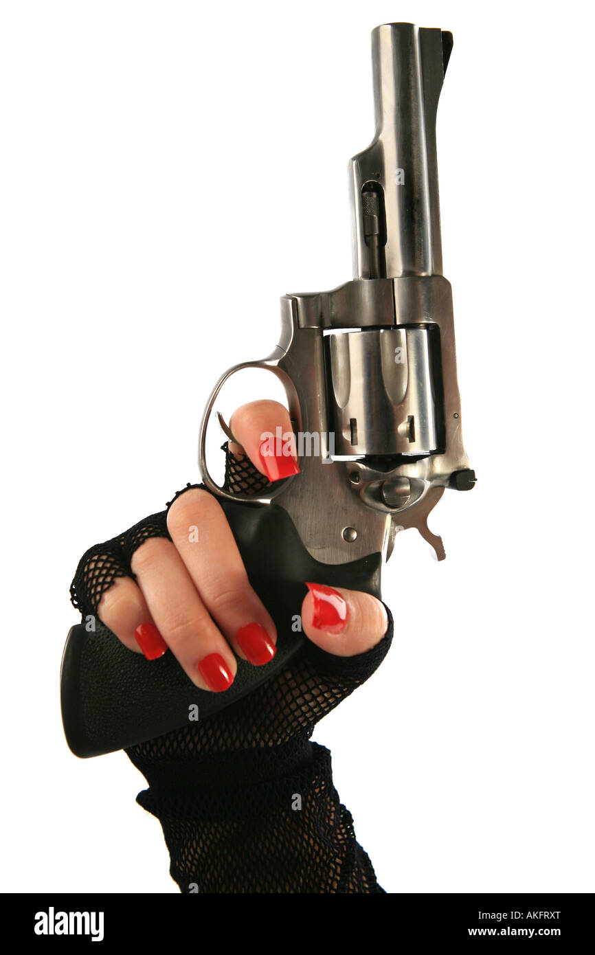 Womans hand holding a 357 caliber hand gun isolated on white background Stock Photo