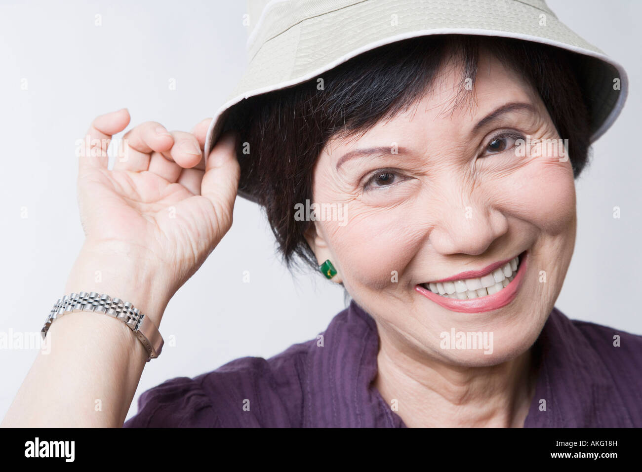 Portrait of a senior woman smiling Stock Photo - Alamy