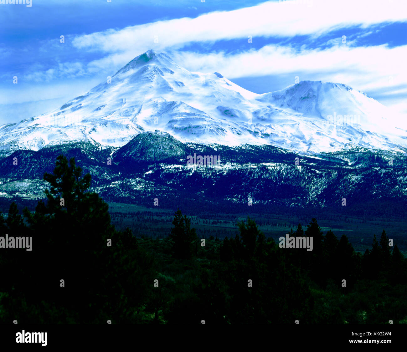 Mount Shasta rises over the lowlands of Northern California Stock Photo