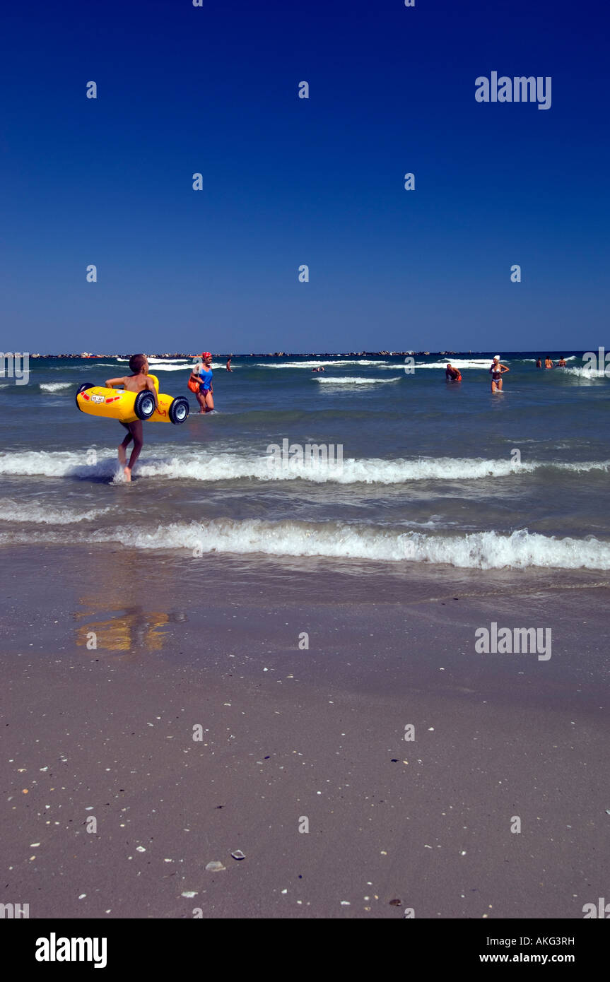 People at leisure Beach at Mamaia Black Sea Dobrogea Romania Stock Photo
