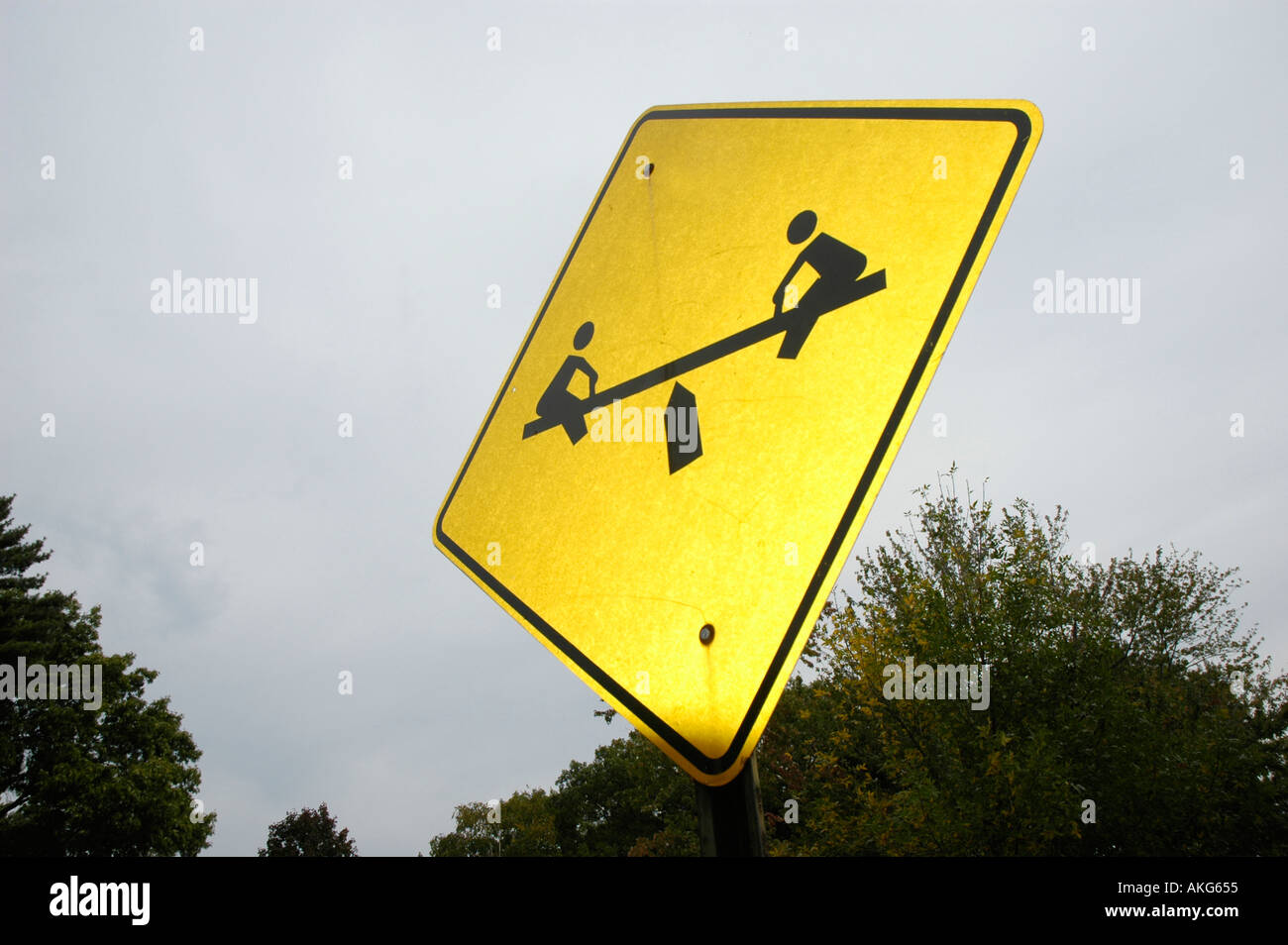 Teeter totter Children sign at Kids Playground in public park Stock