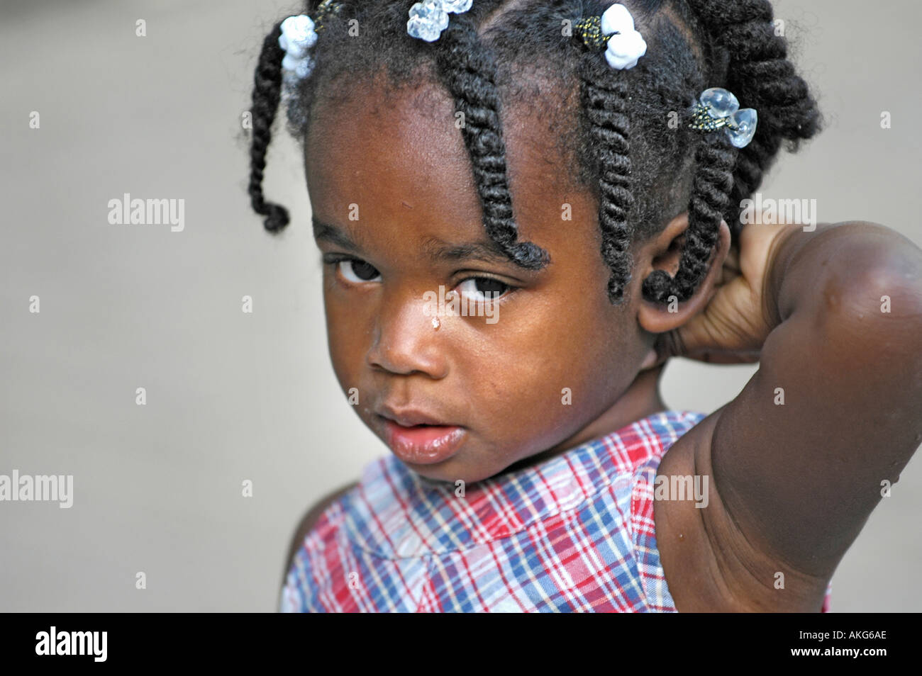 Little Girl Sisters With Beads In Hair 3 And 5 Stock Photo