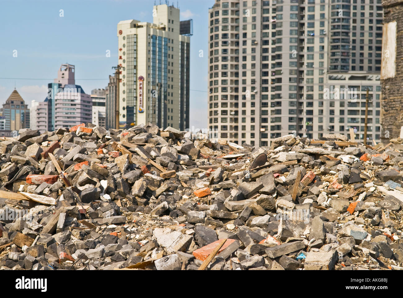 Rubble Of Destroyed Building With Modern Apartment Buildings In 