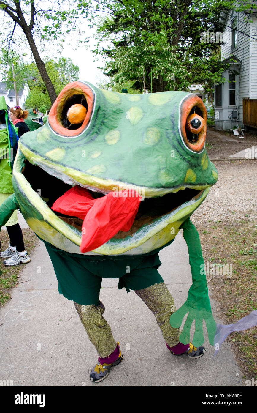 Portrait of frog with red tongue representing creatures from water. MayDay Parade and Festival. Minneapolis Minnesota USA Stock Photo