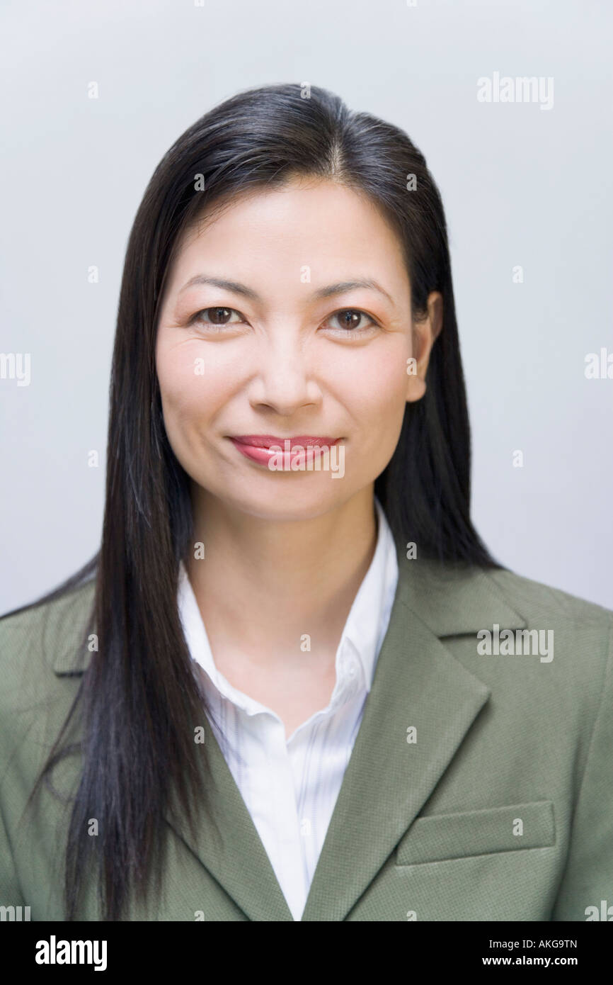 Portrait of a businesswoman smirking Stock Photo