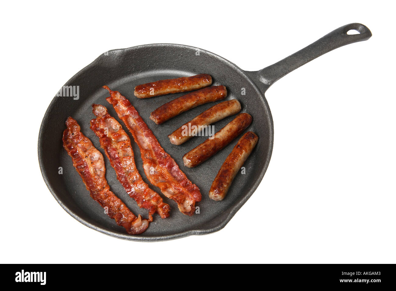 Bacon and Sausage in Frying Pan Stock Photo Alamy
