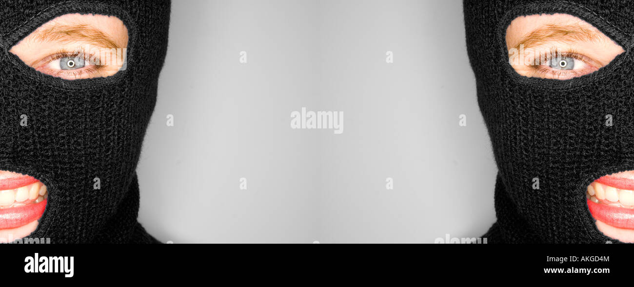 A stock photograph of an attractive woman wearing a balaclava Stock