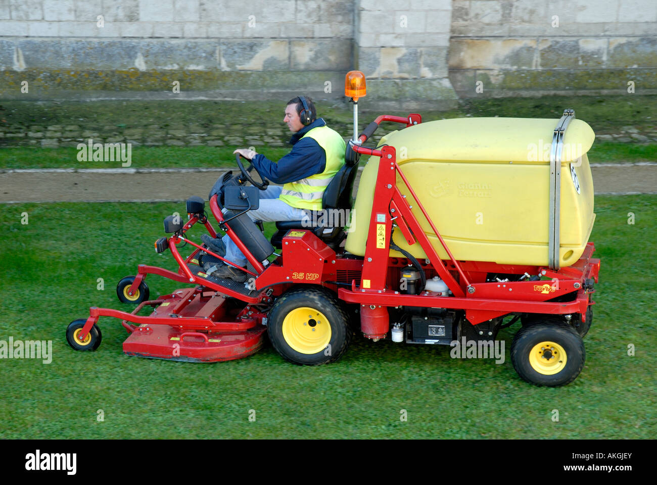 Industrial grass mower, France. Stock Photo