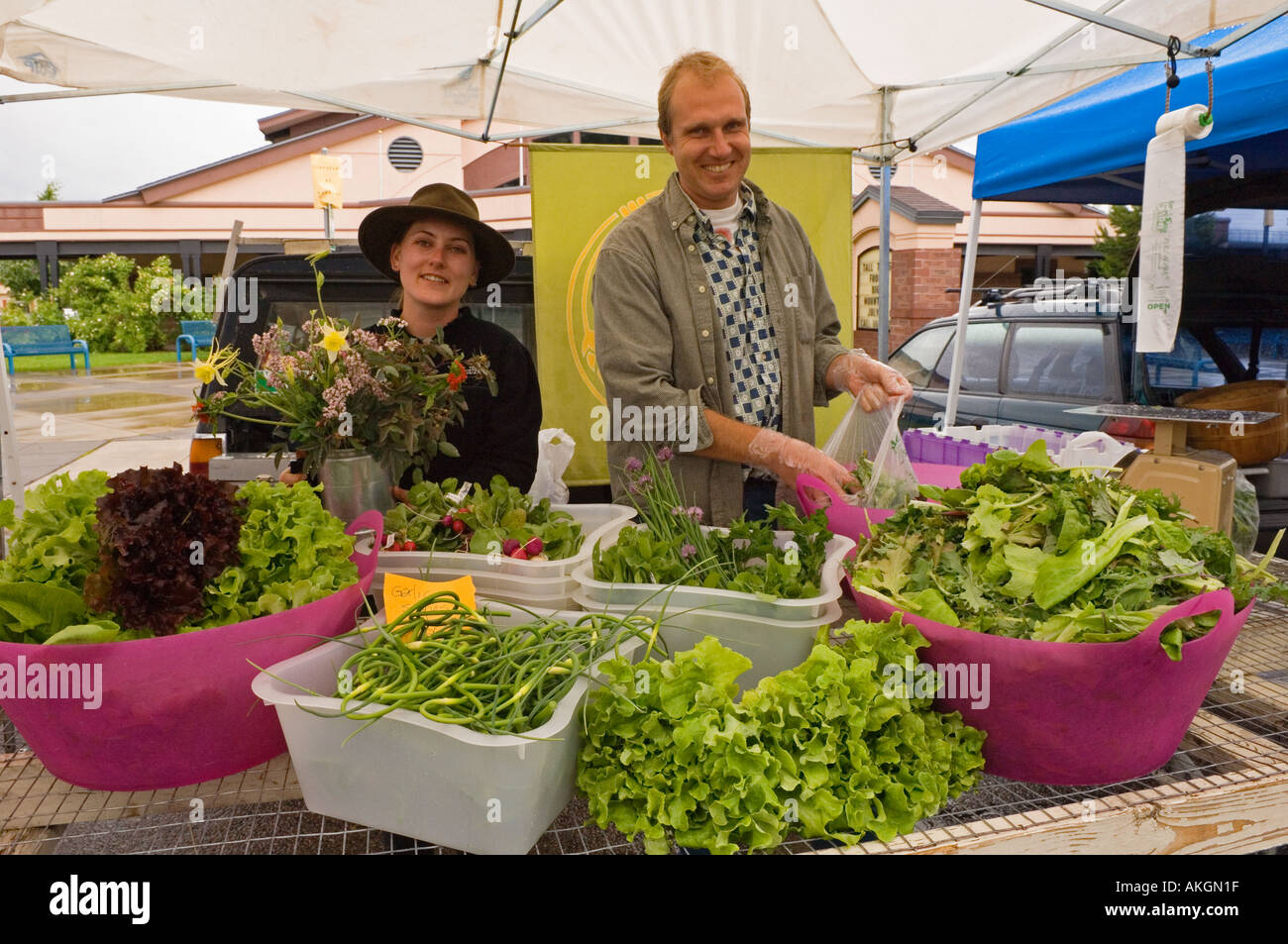 Amanda Buchanan and Mike Jopek with their produce at the weekly farmers