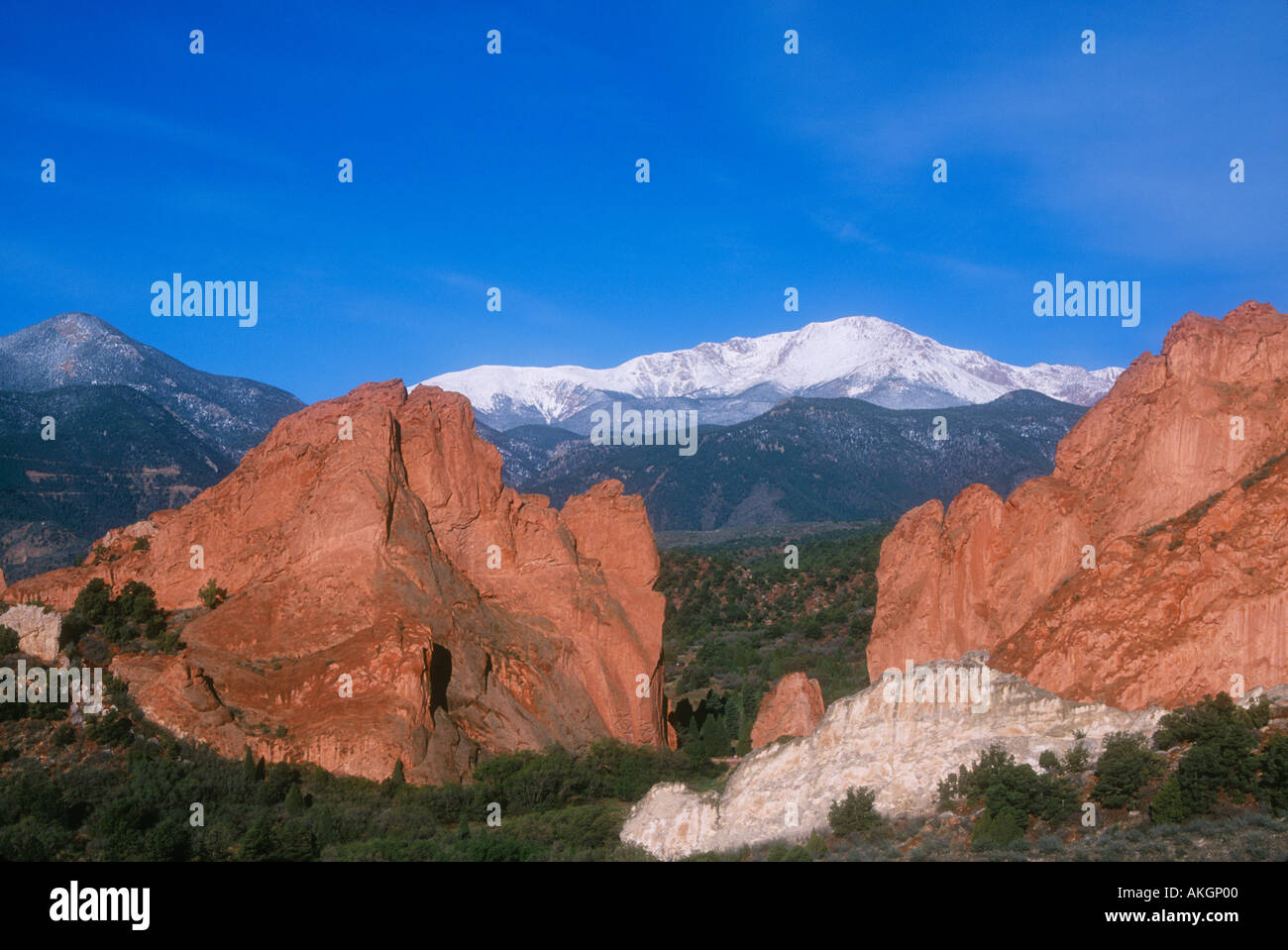 Garden of the Gods rock formations with snow,capped Pikes