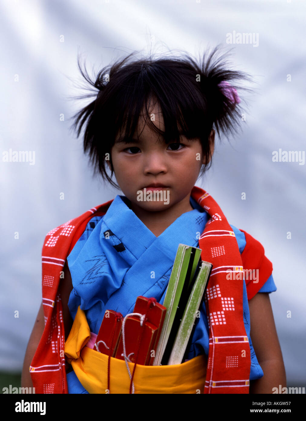 Okinawan girl in traditional costume at Eisa festival Okinawa Japan