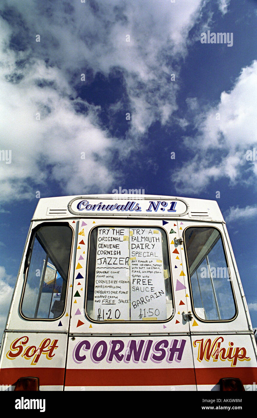 a cornish ice cream van with deep blue sky behind the van and fluffy clouds in cornwall with cornish ice cream Stock Photo