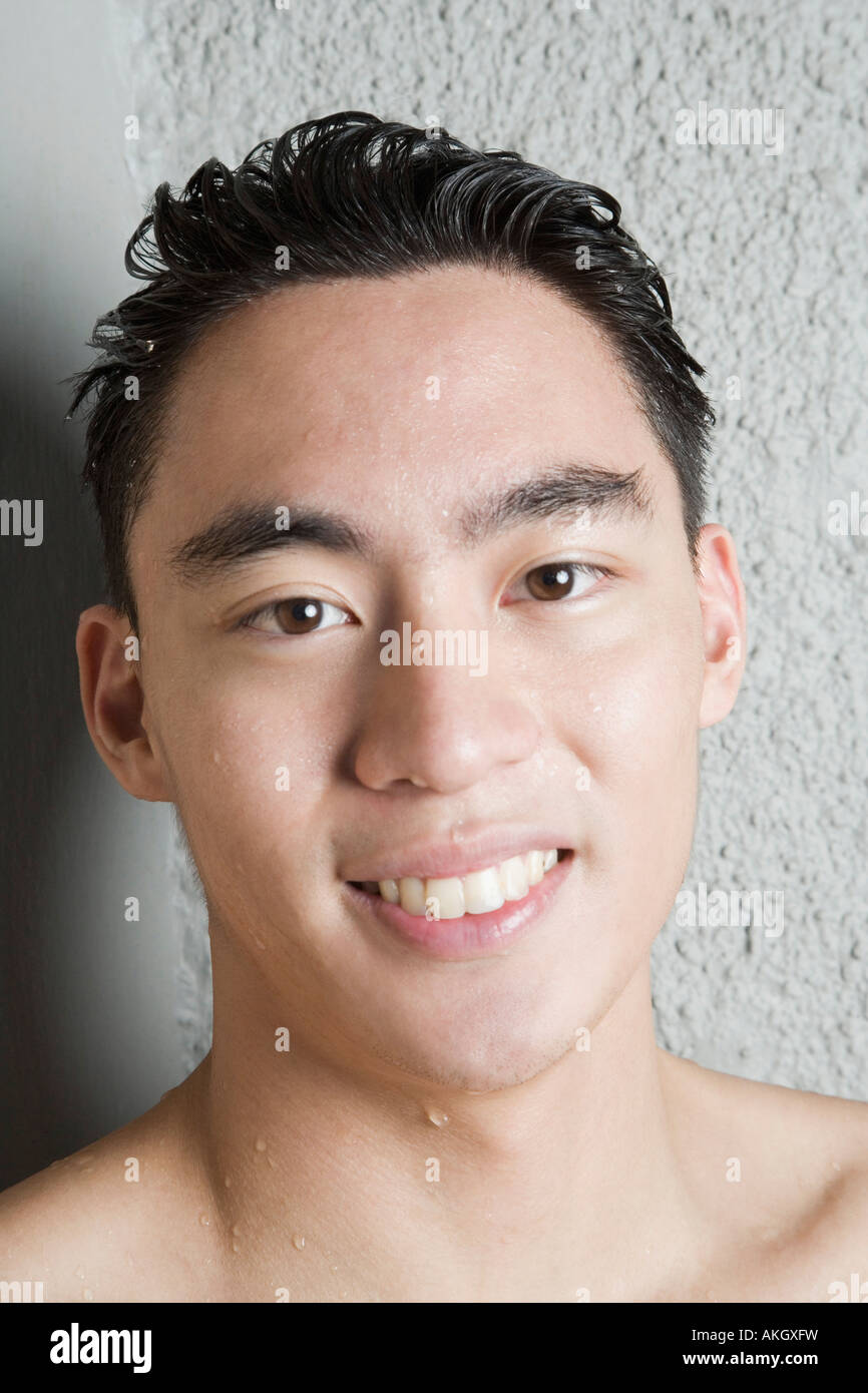 Portrait of a young man smiling Stock Photo - Alamy