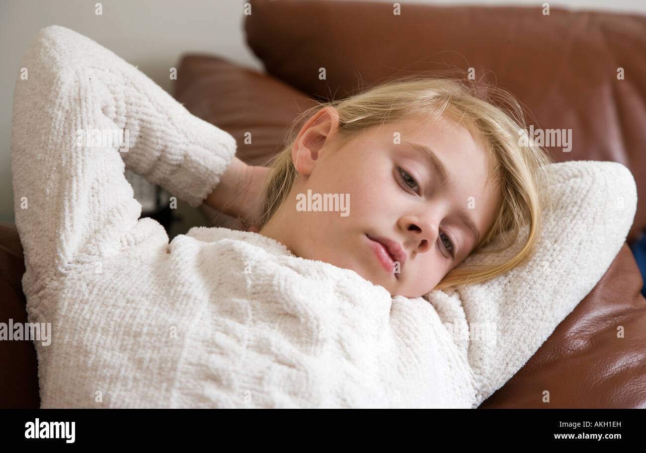Young child looking bored Stock Photo
