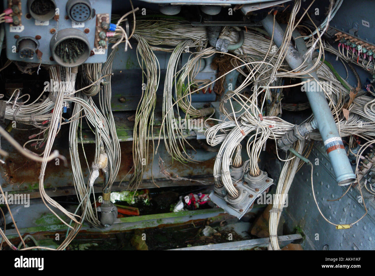 Details of the cabling in old grungy military aircraft Stock Photo - Alamy