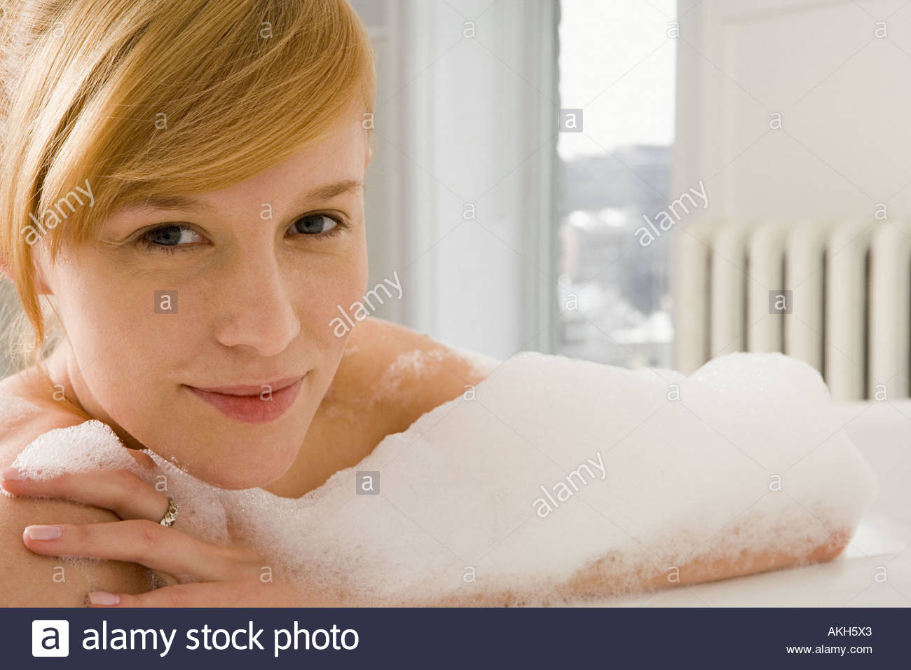Woman Taking A Bubble Bath Stock Photos & Woman Taking A Bubble Bath