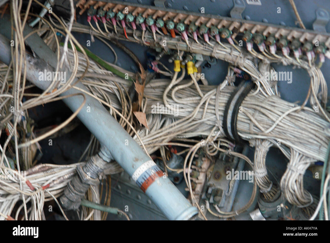 Details of the cabling in old grungy military aircraft Stock Photo - Alamy