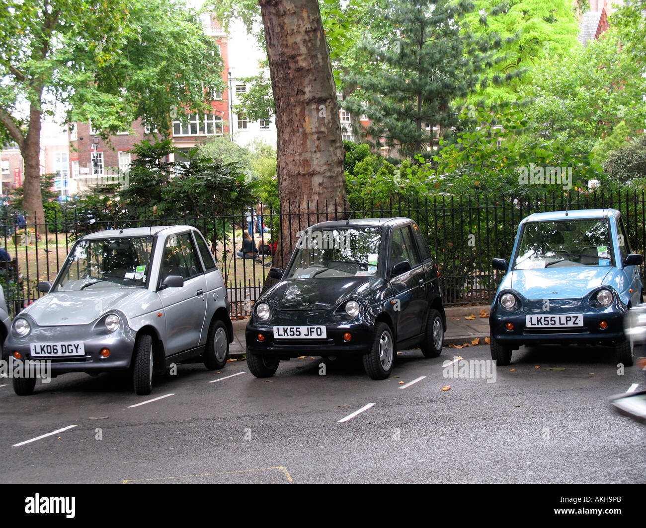 Reva G Wiz electric cars in central London  in the UK Stock Photo