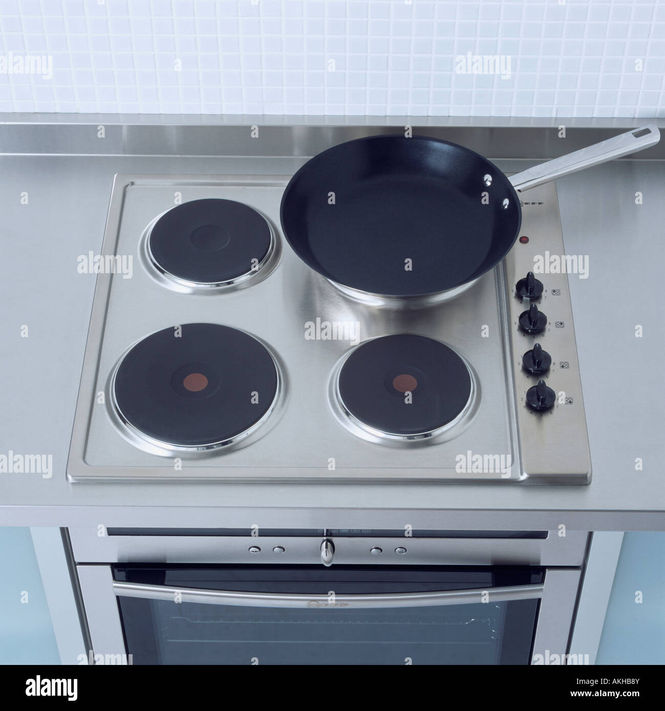 Close up of nonstick pan on electric hob oven Stock Photo