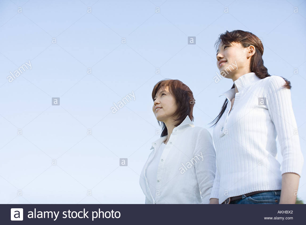 Asian mom and daughter bathing together Asian mom and daughter bathing together