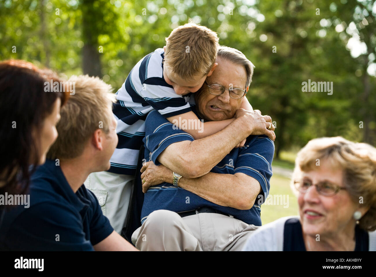 ...Child hugs grandfather - AKHBYY from Alamy&x27;s library of million...