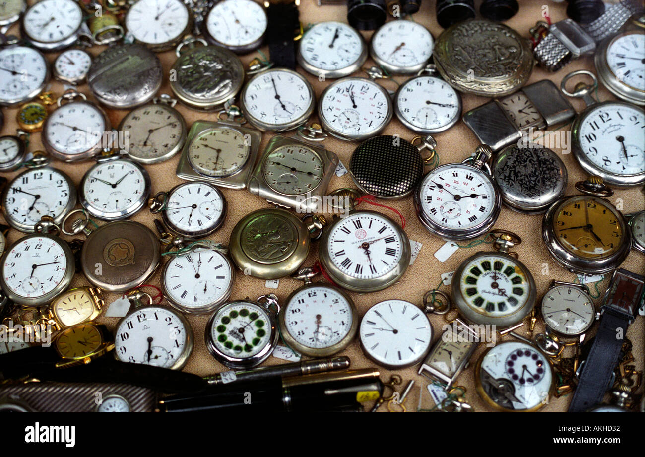 Collection of old pocket watches at a flea market Stock Photo Alamy