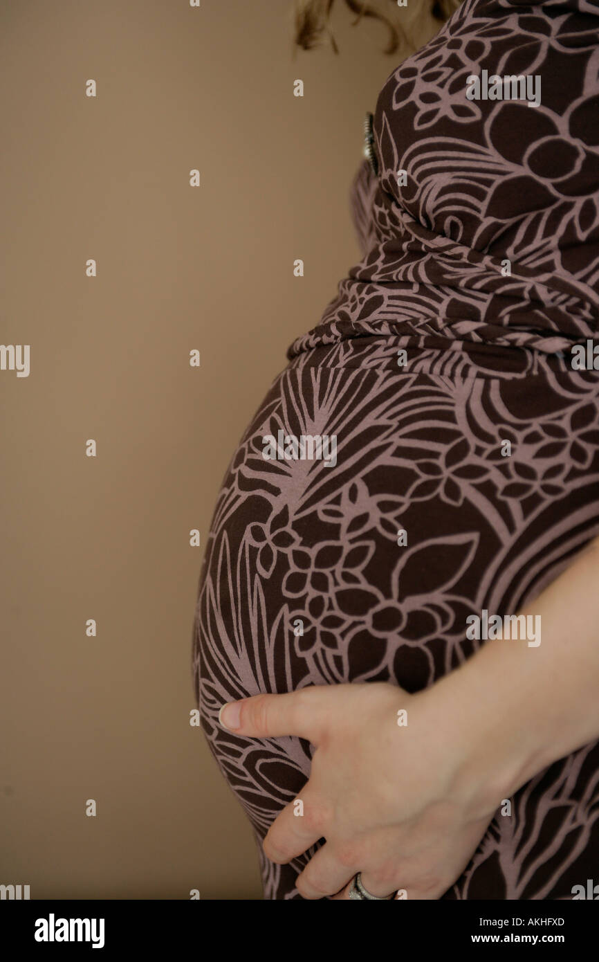 Pregnant stomach Stock Photo
