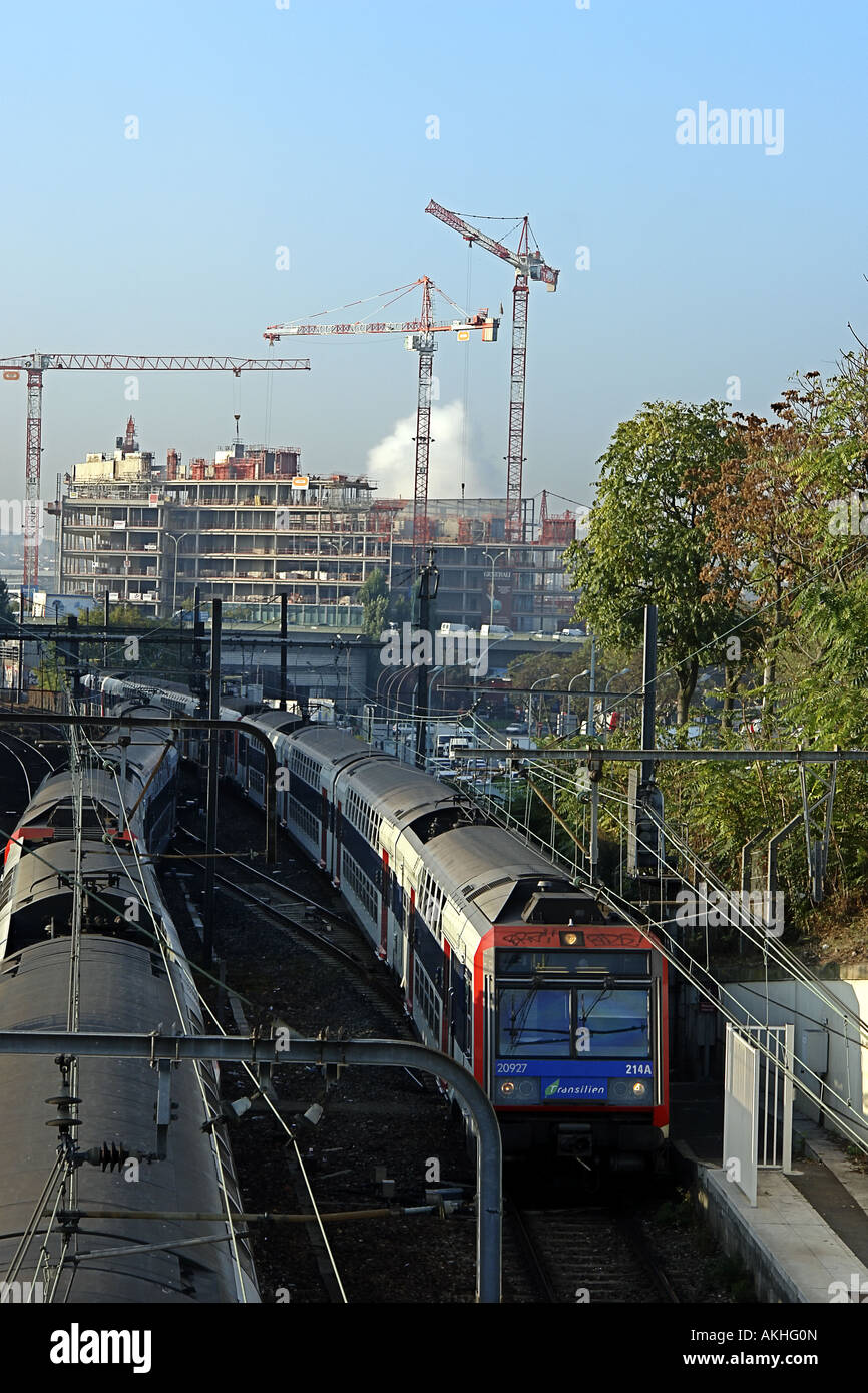 cranes on building site and trains in business district Issy les Moulineaux Paris France Stock Photo
