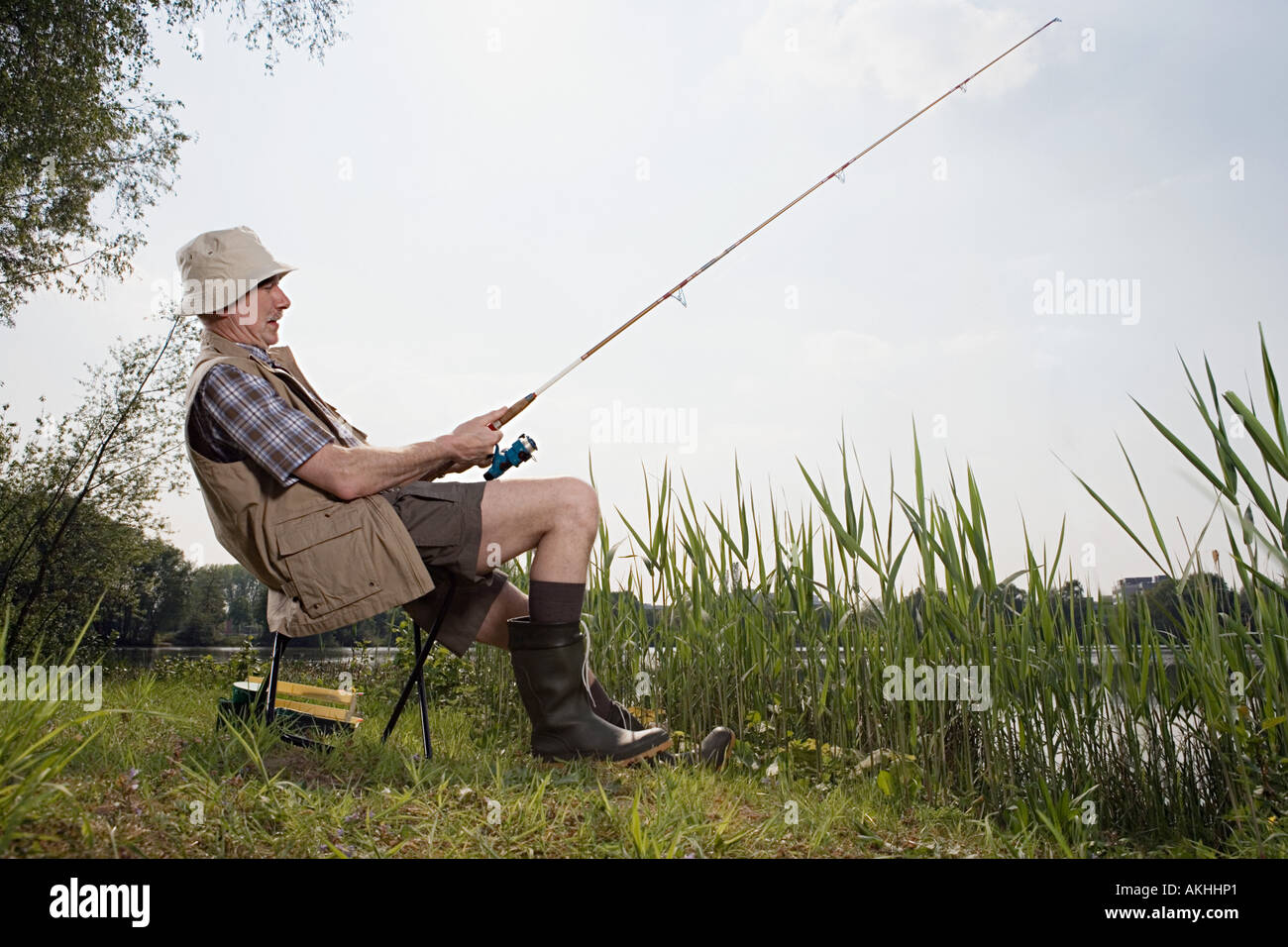 Senior man fishing Stock Photo
