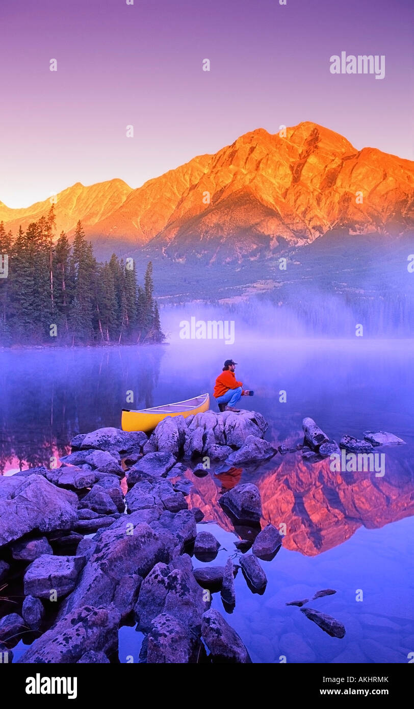 Man sitting on lake hi-res stock photography and images - Alamy