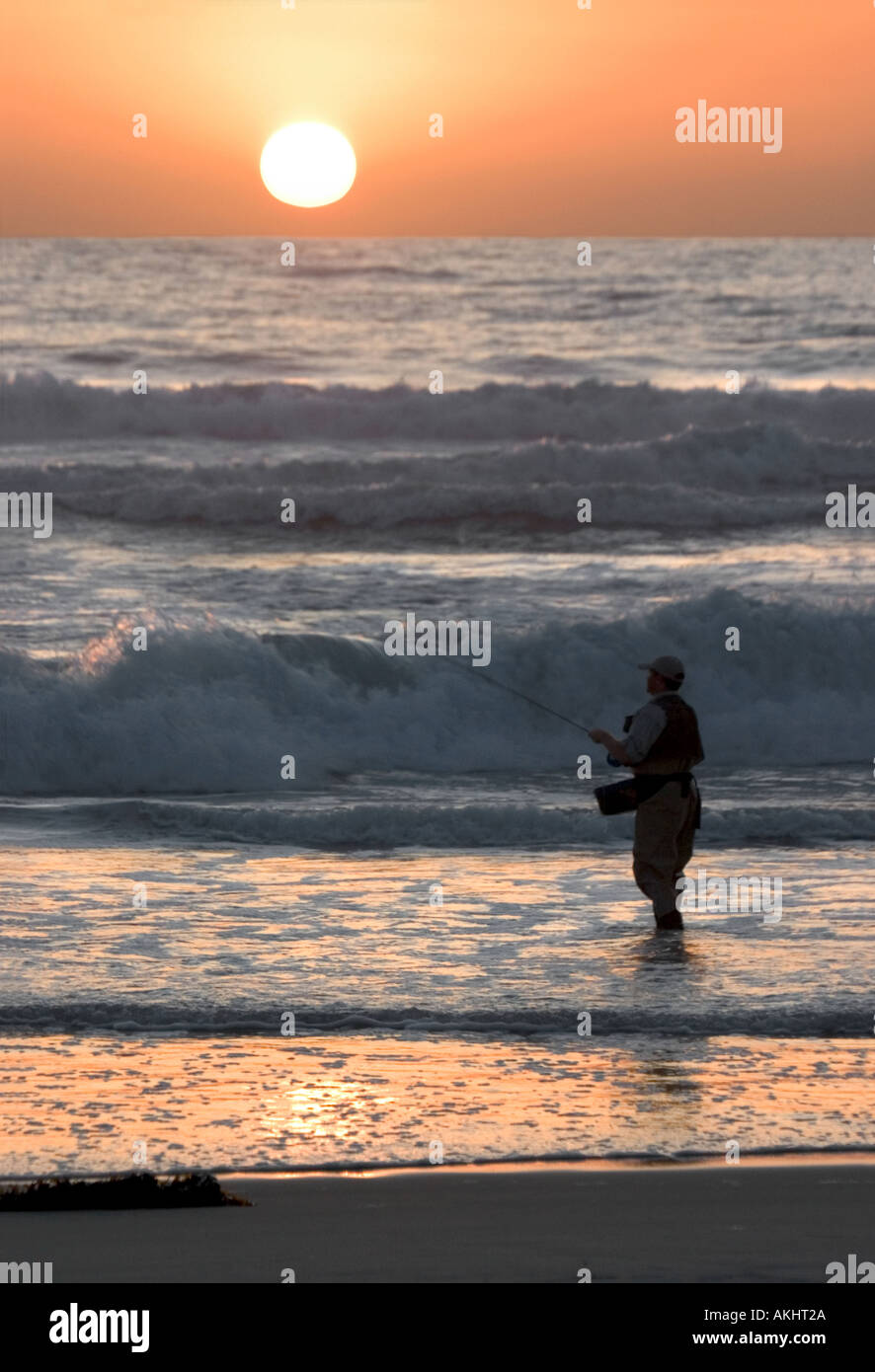 Silhouette man fishing on beach hi-res stock photography and images - Alamy