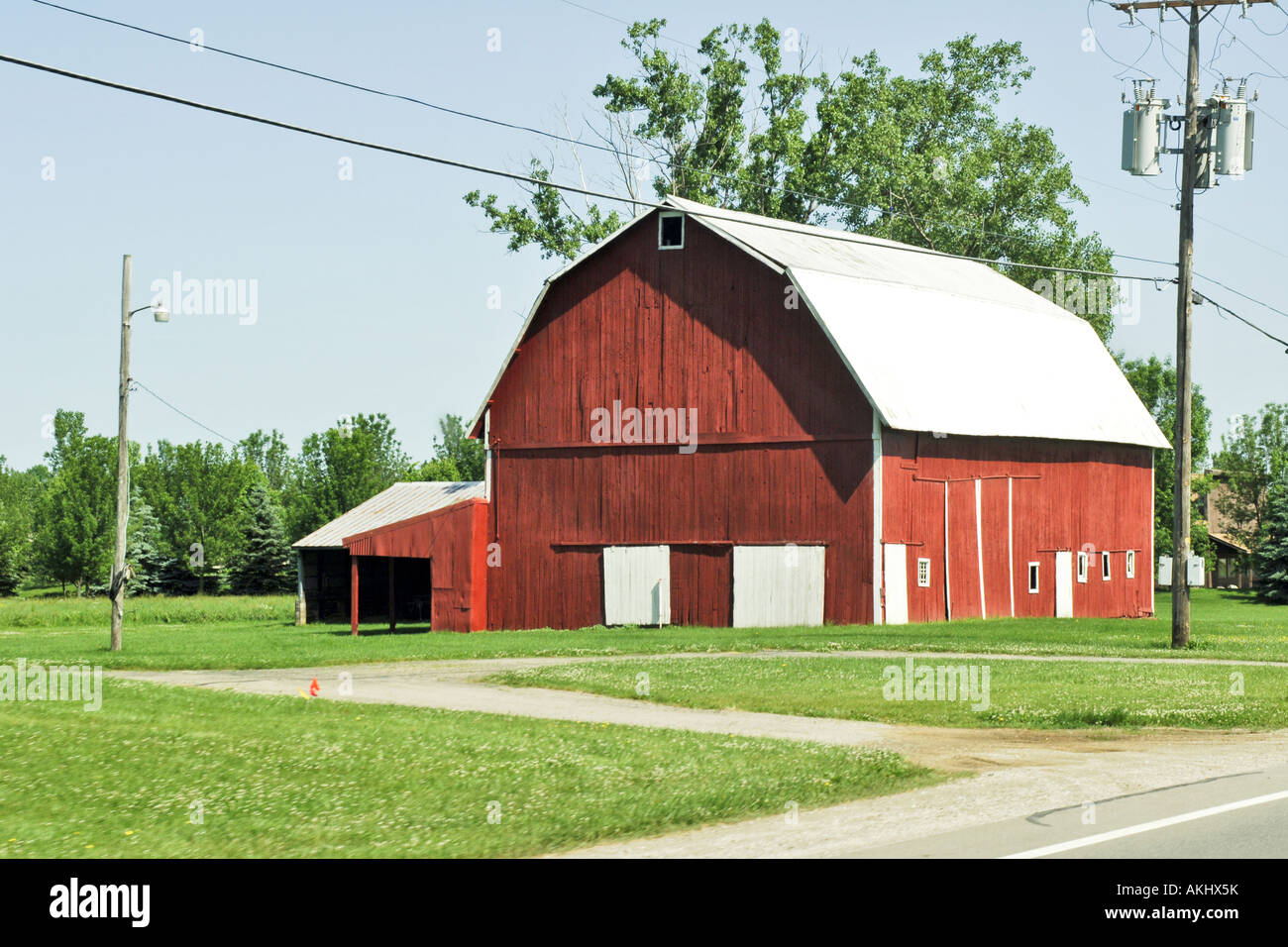 Traditional Dutch style red barn in rural Wisconsin WI Stock Photo