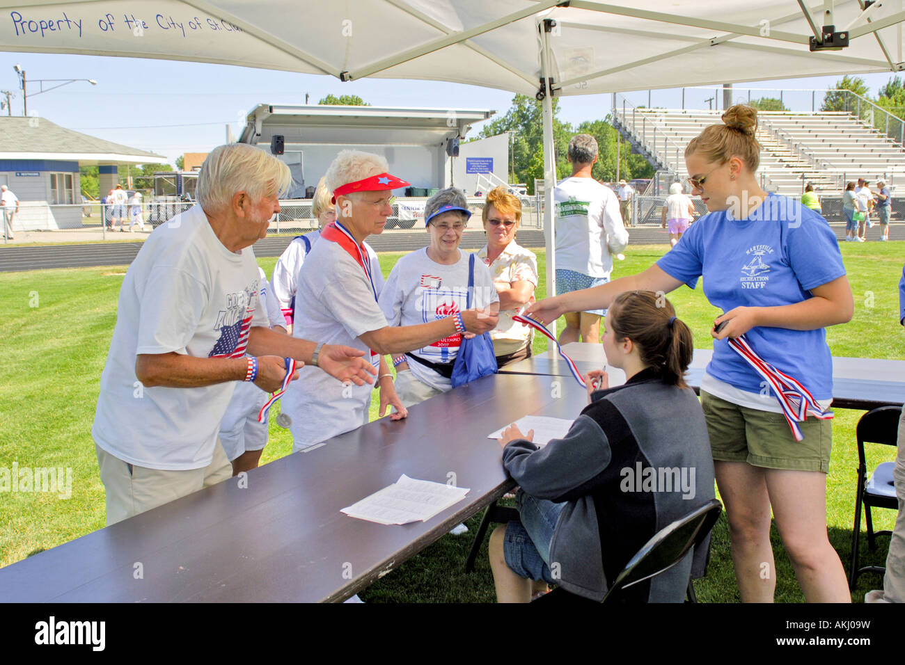 Senior females go to collect their medals at the Olympics Marysville Michigan MI Stock Photo
