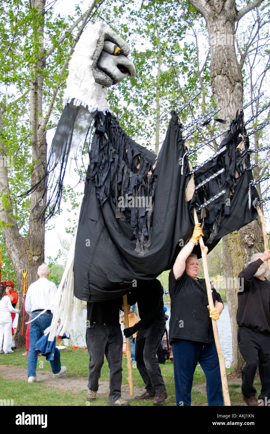 Puppeteers acting hawk puppet tree hires stock photography and images