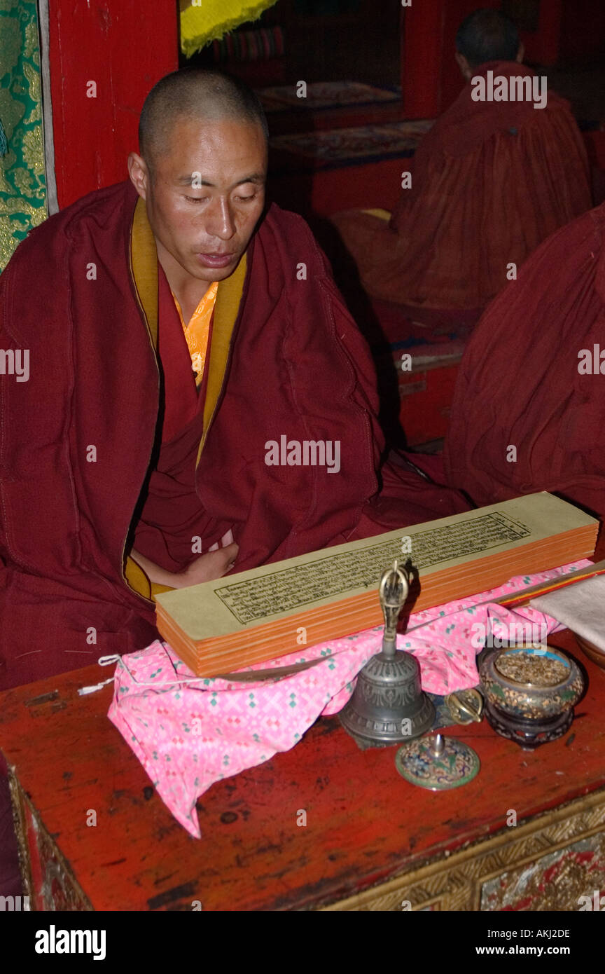 Gelukpa Tibetan Buddhist monks recites prayers Dhokham Garther Monastery Kham Sichuan Province China Tibet  Stock Photo