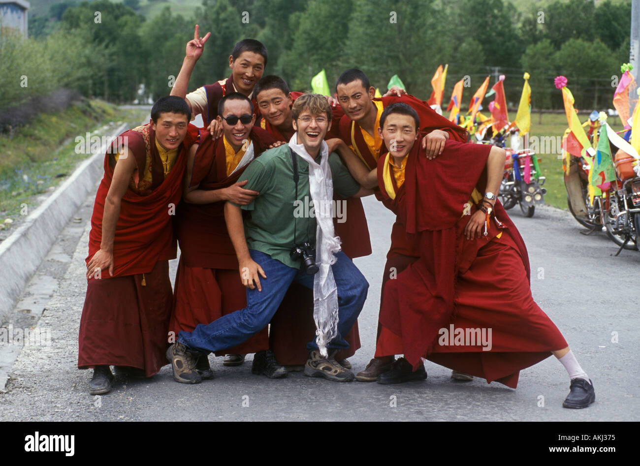 Tibetan Buddhist monks with Bodhi Garrett in the Zi chu Valley Kham Eastern Tibet Sichuan Province China Stock Photo