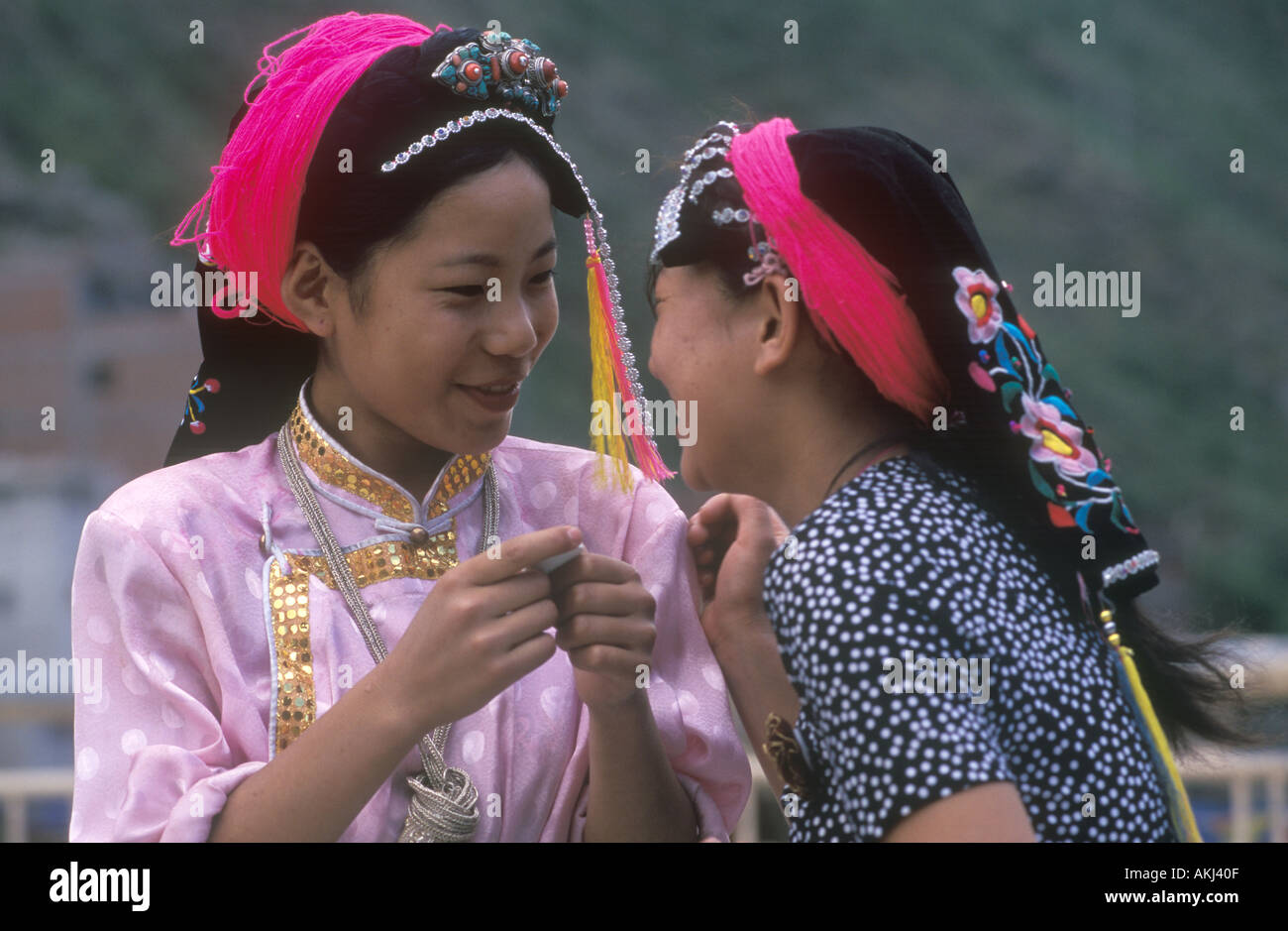 Girls of the Qiang tribe in traditional dress in town of Danba Sichuan