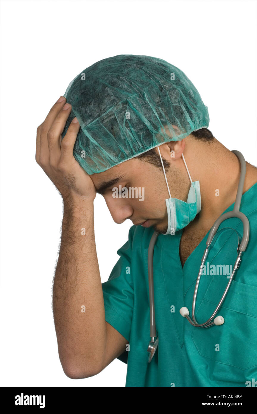 Tired doctors make mistakes hi-res stock photography and images - Alamy